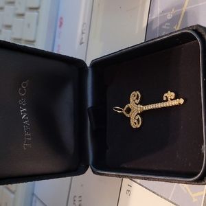 Tiffany and Co. 18k gold and diamond Fleur-de-lis pendant